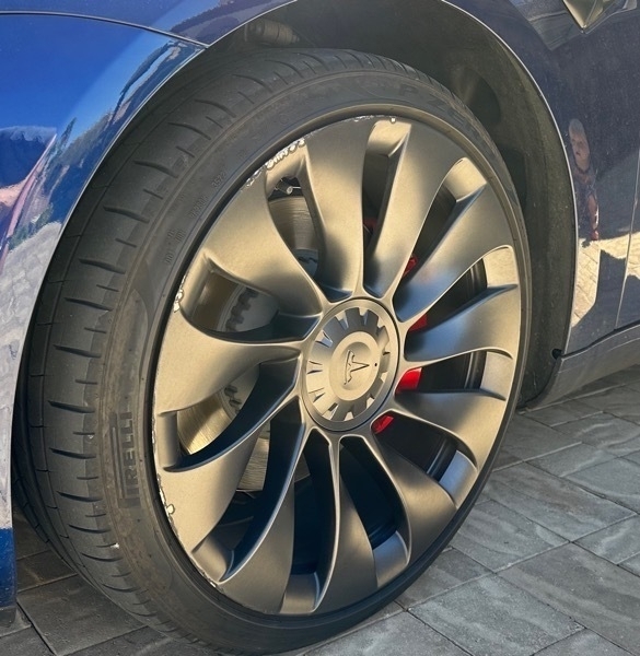 IMG_1053.jpeg Tesla Ubertine wheel with curb rash